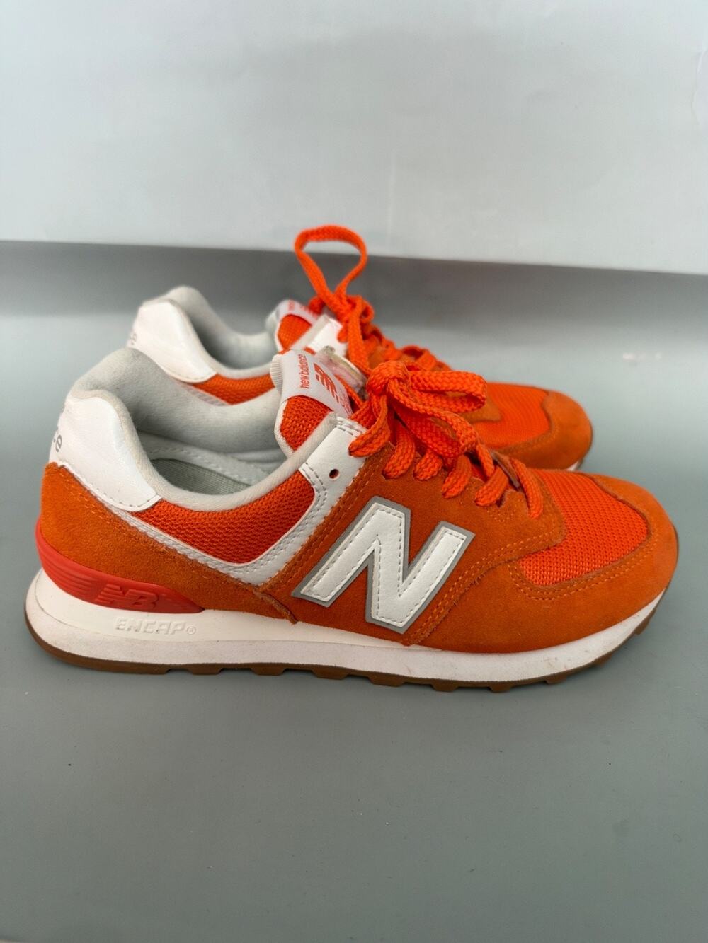 New Balance 574 Sneakers Orange White Gray Womens Size 7 Suede and Mesh S4